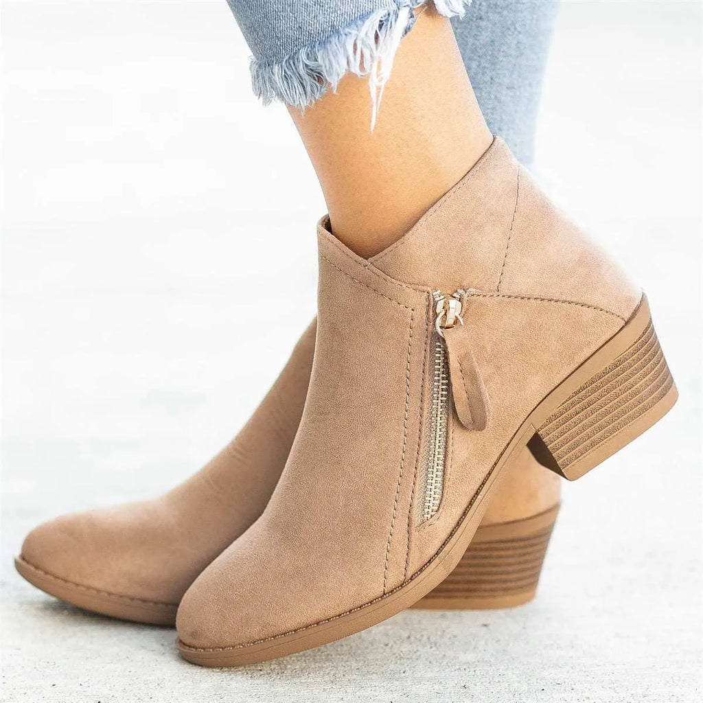 Blue Dr Martens women's suede ankle boots with a side zip and chunky heel
