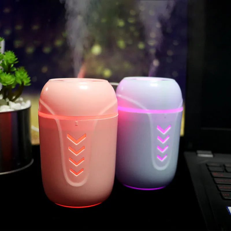 Portable columnar humidifier with 200ml capacity in blue, pink, or white colours showing USB and AC power options