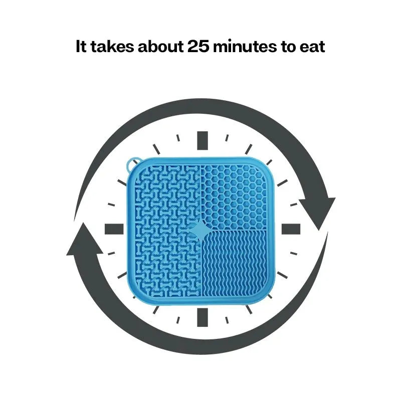 Blue silicone dog licking mat with textured surface and suction cups on a kitchen floor.