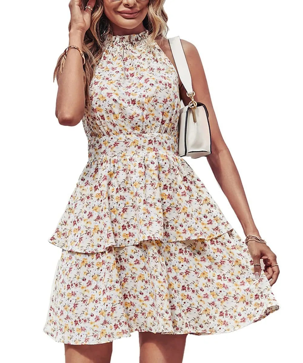 Women's printed halter-neck backless summer dress with ruffle detail in an A-line shape.