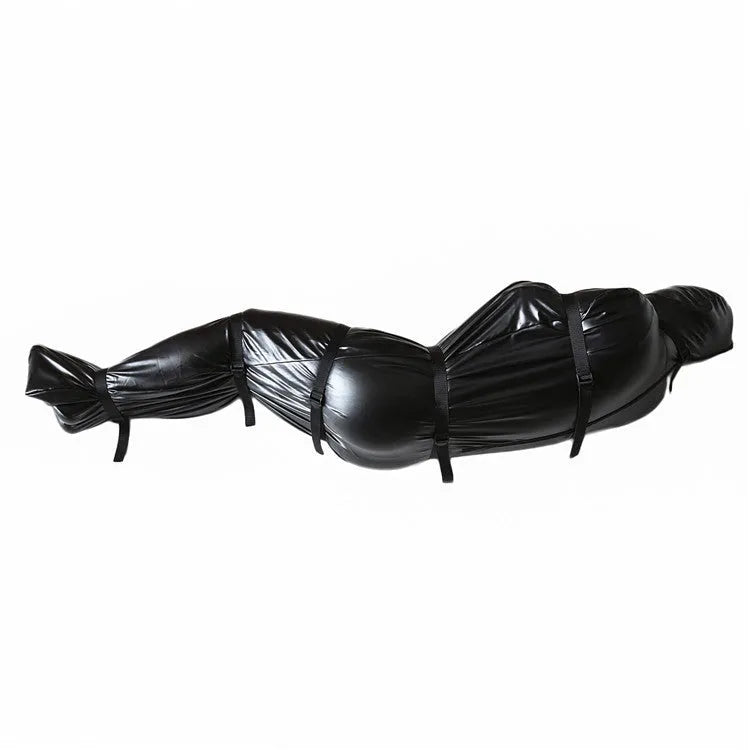 Black patent leather bondage restraint set showing full harness and six ratchet tie-down straps
