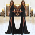 Long red knitted evening dress with hollow design detail on the skirt and a hanging neckline.