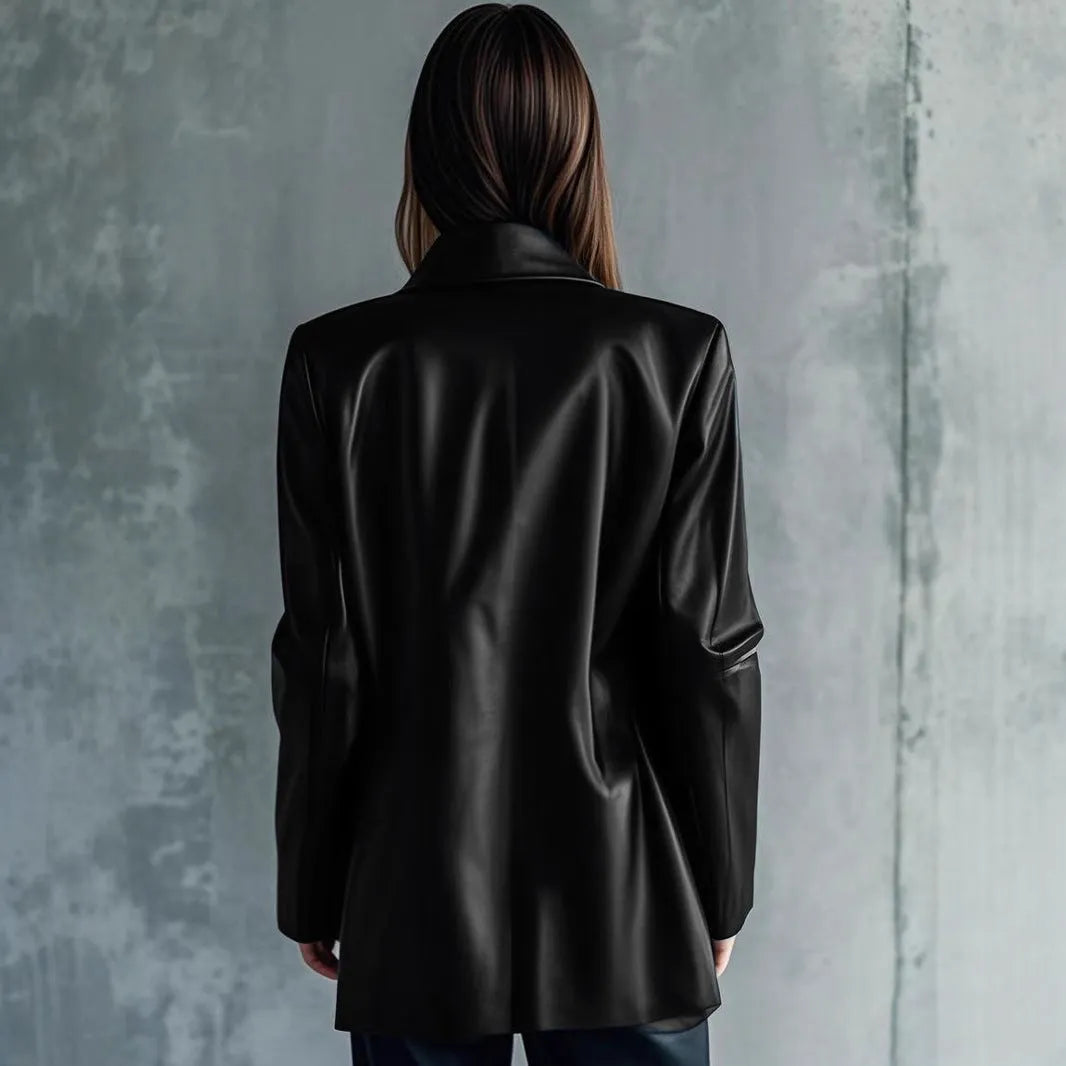 Black mid-length polyester leather jacket for women on a hanger.