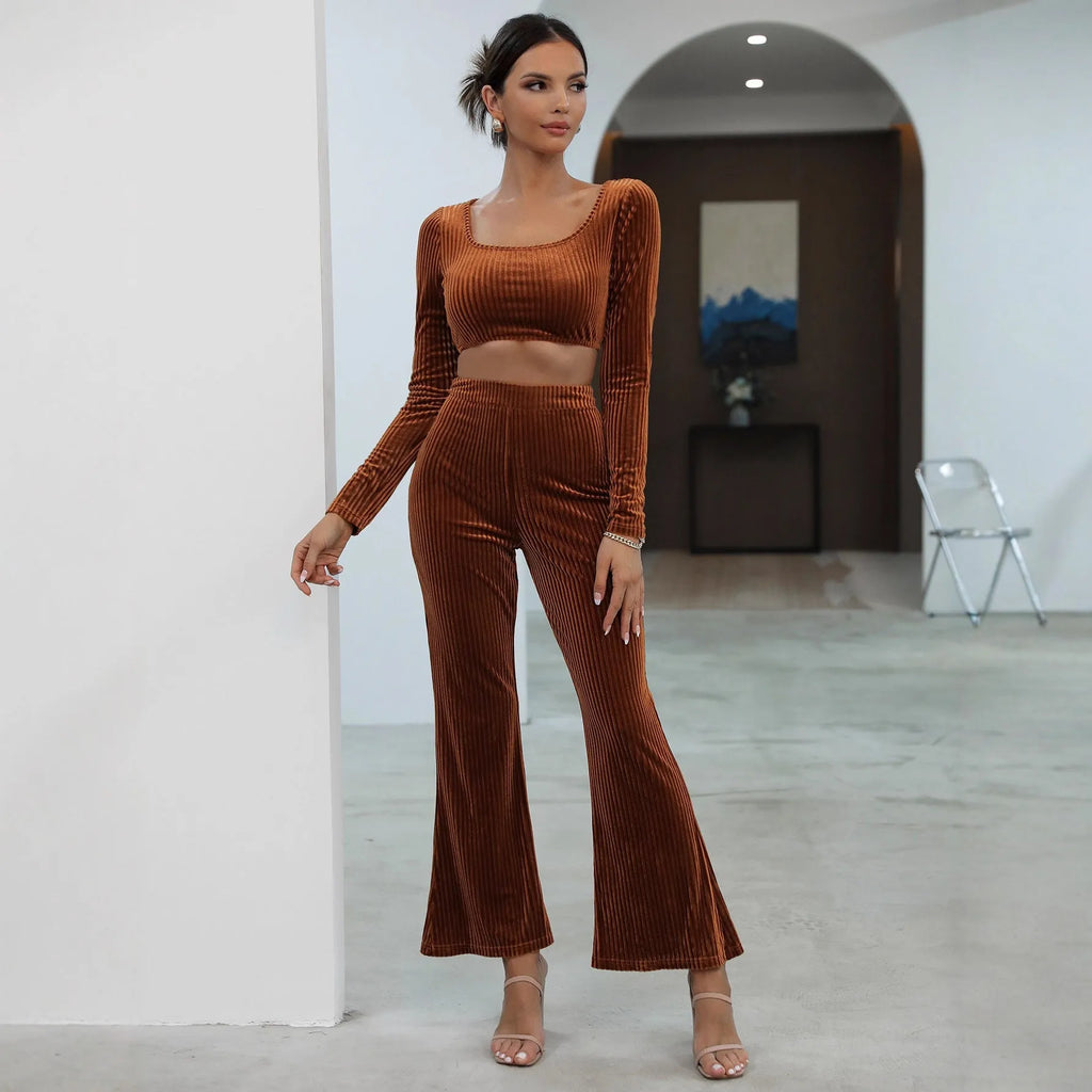 Caramel coloured long sleeve sweater and trouser casual set laid flat.