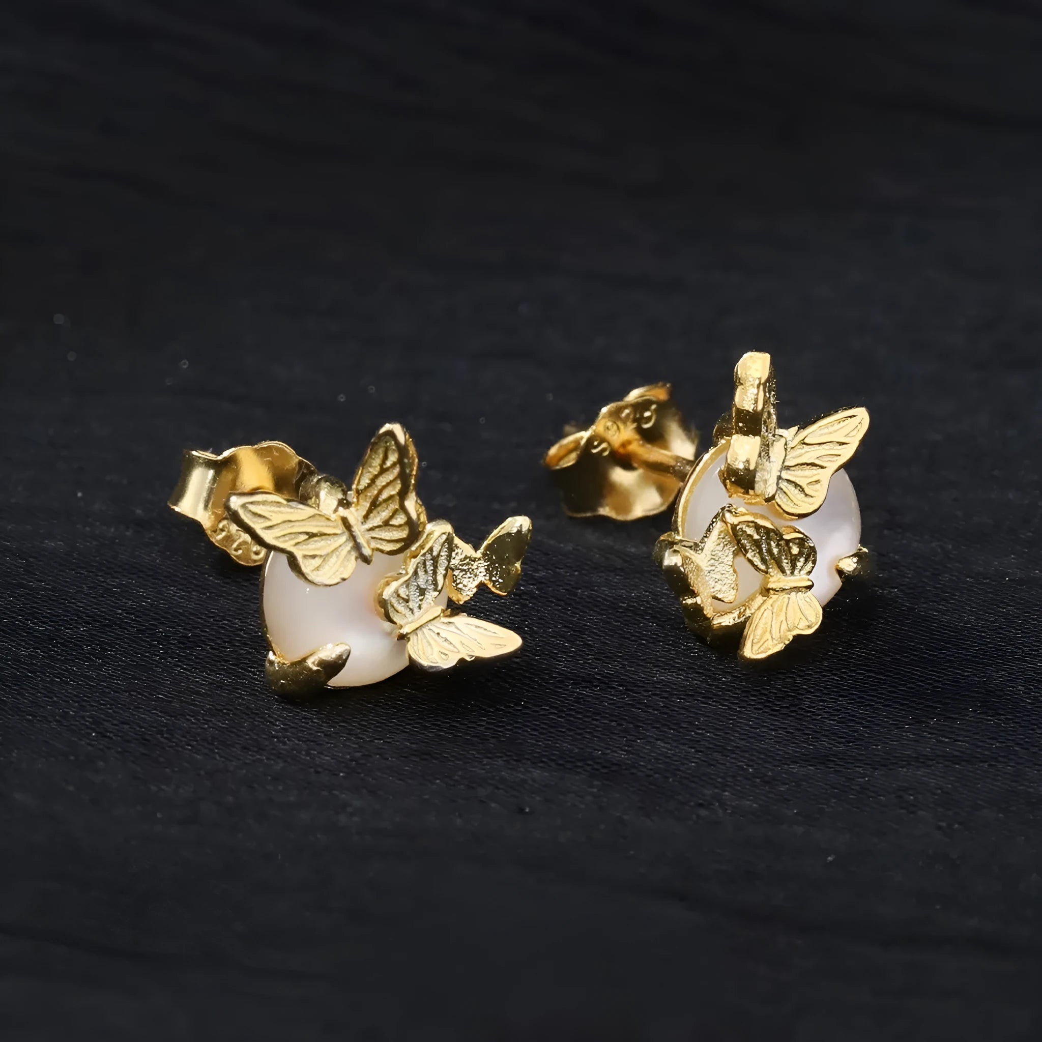 Butterfly ear studs in 925 sterling silver with gold or white gold electroplated finish