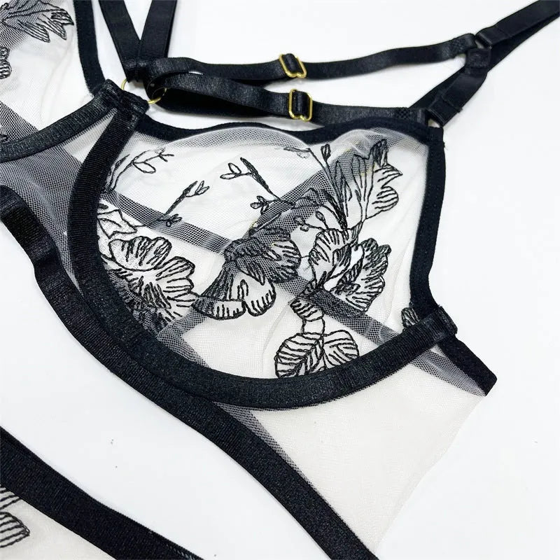 Black lace mesh floral print women's three-piece set with sleeveless top, trousers, and waist ring.