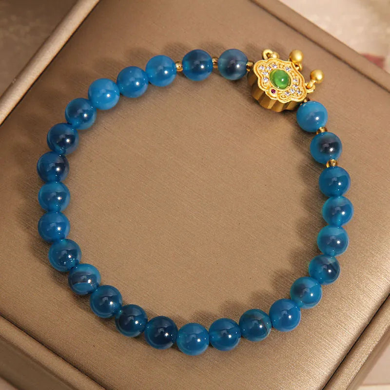 Women's blue agate safety lock pendant bracelet with crystal and rhinestone details
