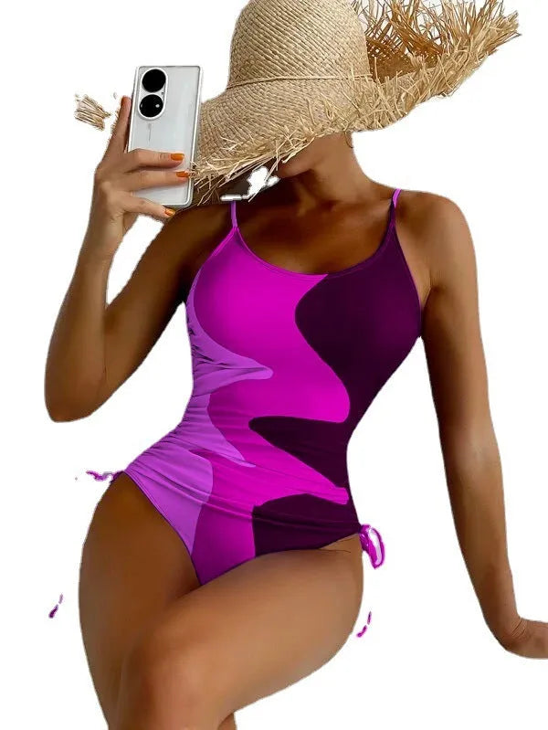 Women's sleeveless one-piece swimsuit in blue, purple, brown, or green colours for swimming sports
