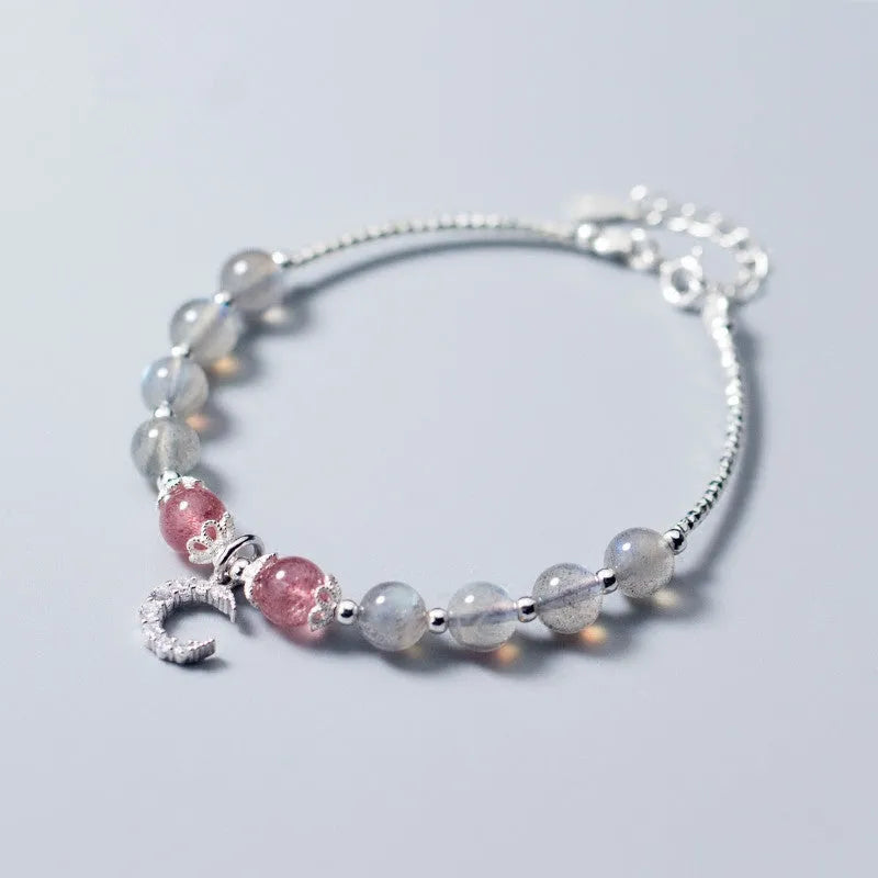 Handmade adjustable moonstone bracelet with crescent moon charm showing 6mm beads and extension chain