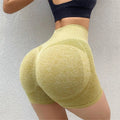 Women's high-waist yoga shorts in various colours with seamless waist design for fitness activities