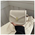 Soft horizontal square messenger bag in clamshell design, shown in black colour.