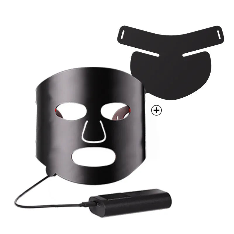 Black and white LED phototherapy face mask with controller showing seven colour light modes