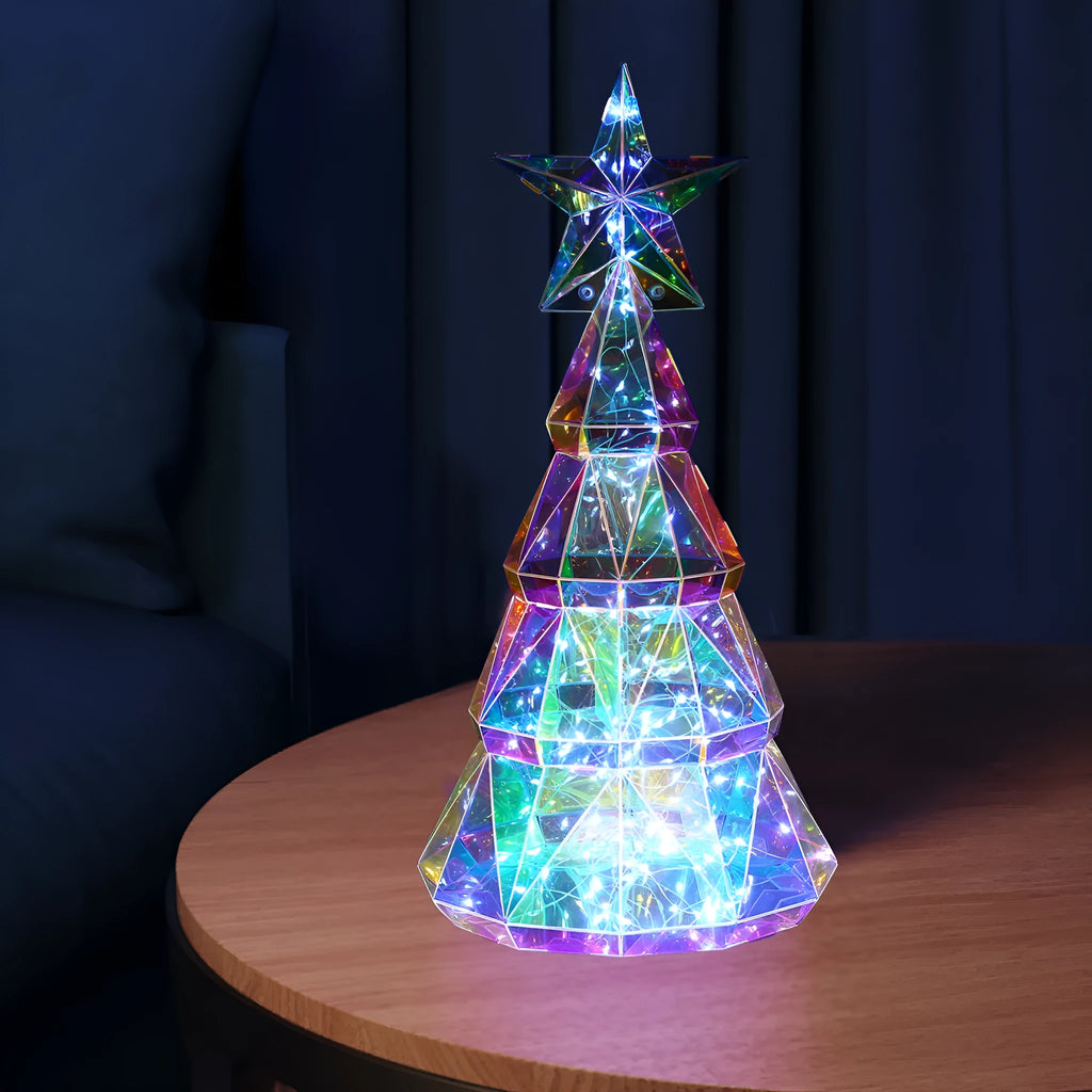 Colourful cartoon-style LED Christmas tree decorative toy on a tabletop
