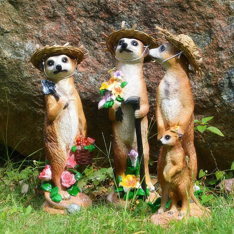 Straw hat mongoose garden ornament figurine in resin plastic.