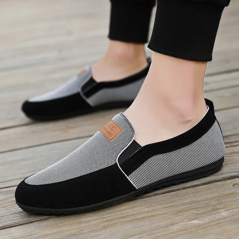 Men's grey and khaki canvas casual shoes with round toe and stitching detail.