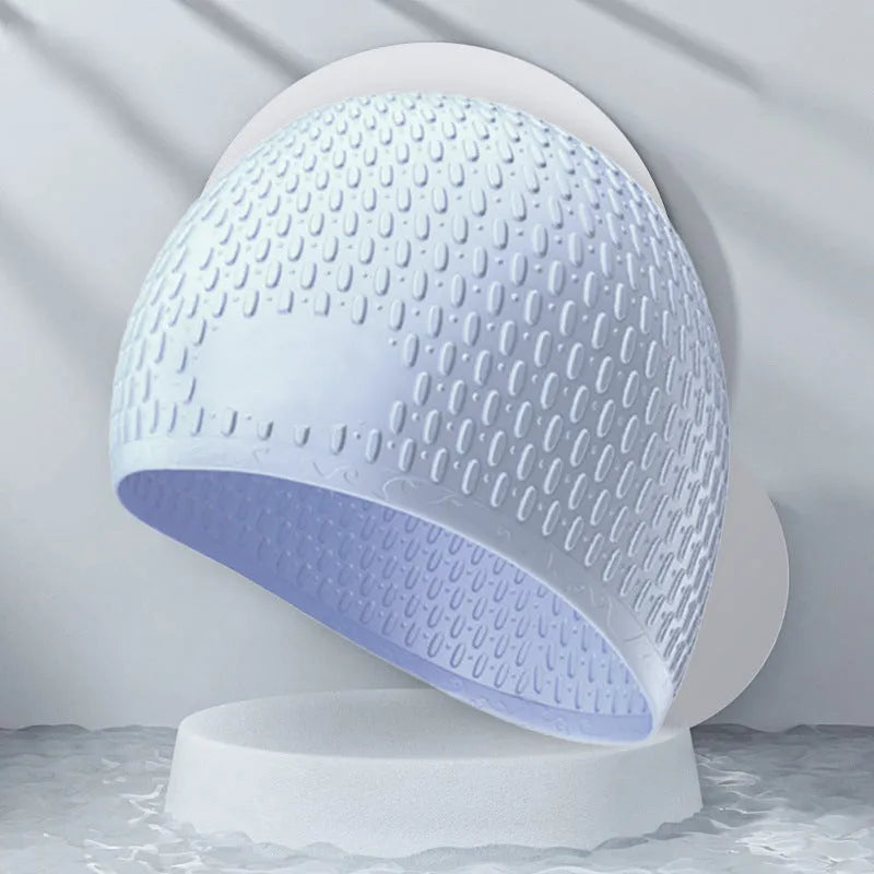 Solid colour silicone swimming cap for adults in one of nine available colours.