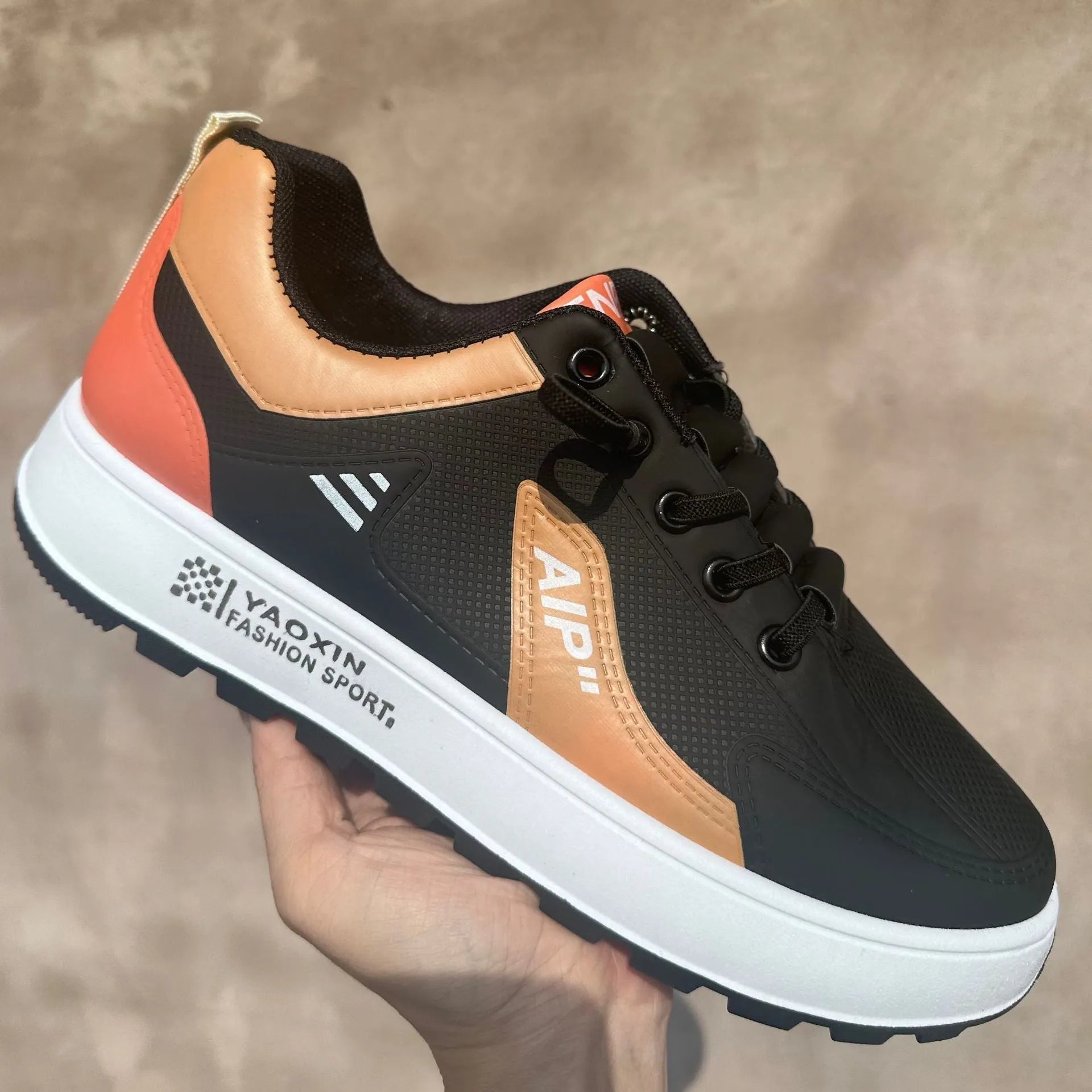 Men's round-toe casual shoes in artificial PU, shown in white and orange, white and black, and white and brown colour options.