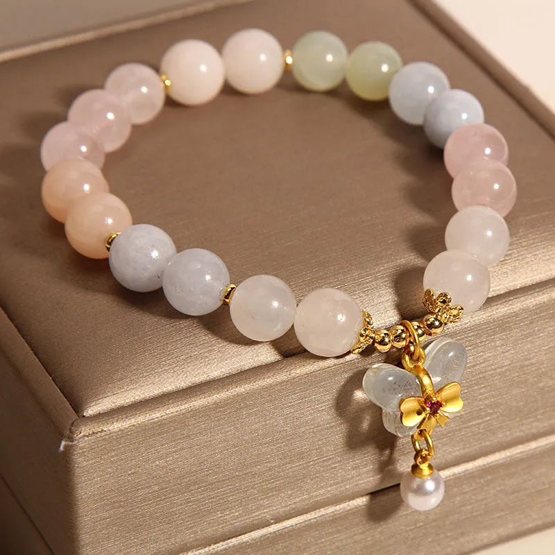 Women's crystal bead bracelet with a colourful natural Morganite stone butterfly pendant.
