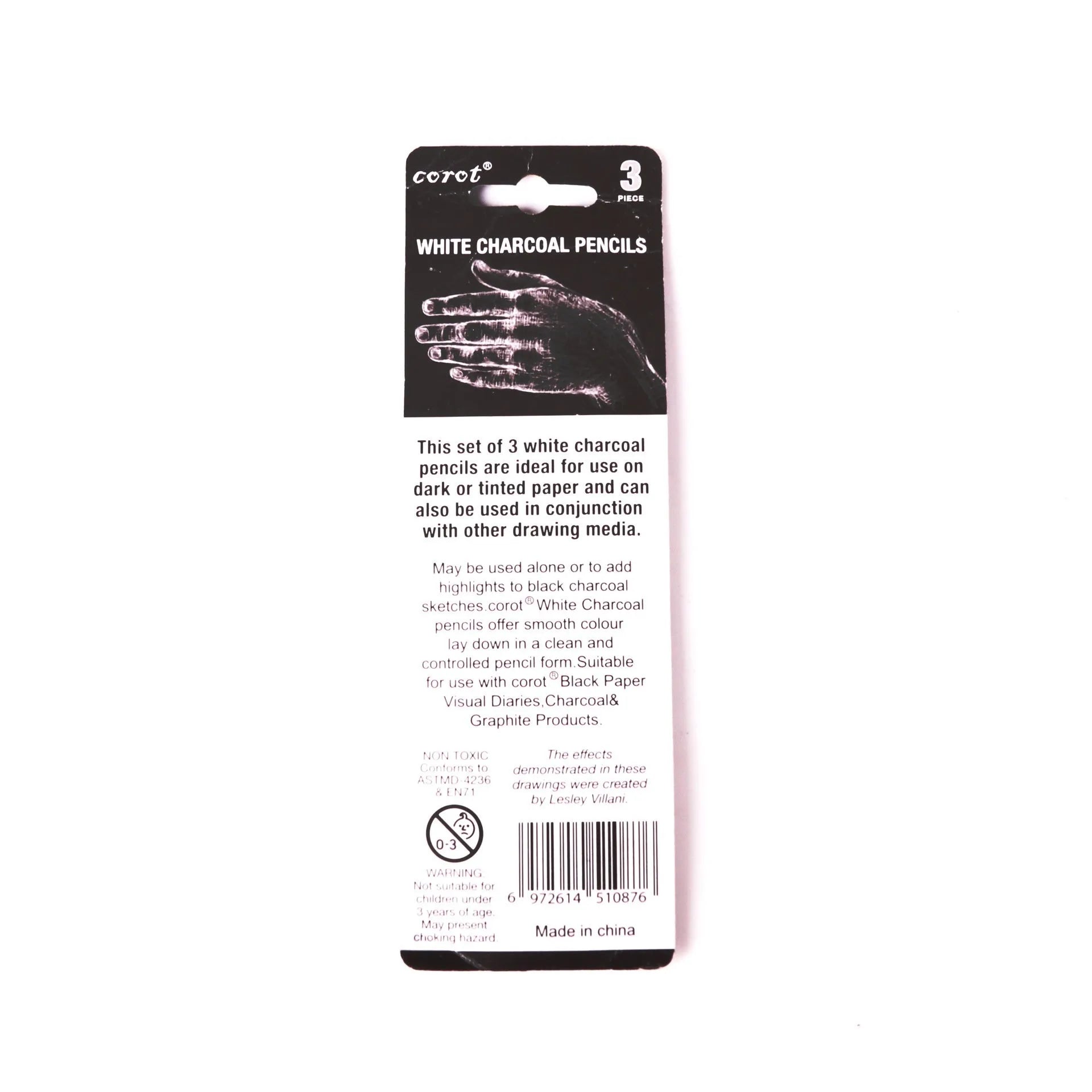 Three white charcoal pencils with wooden casings for drawing and highlighting