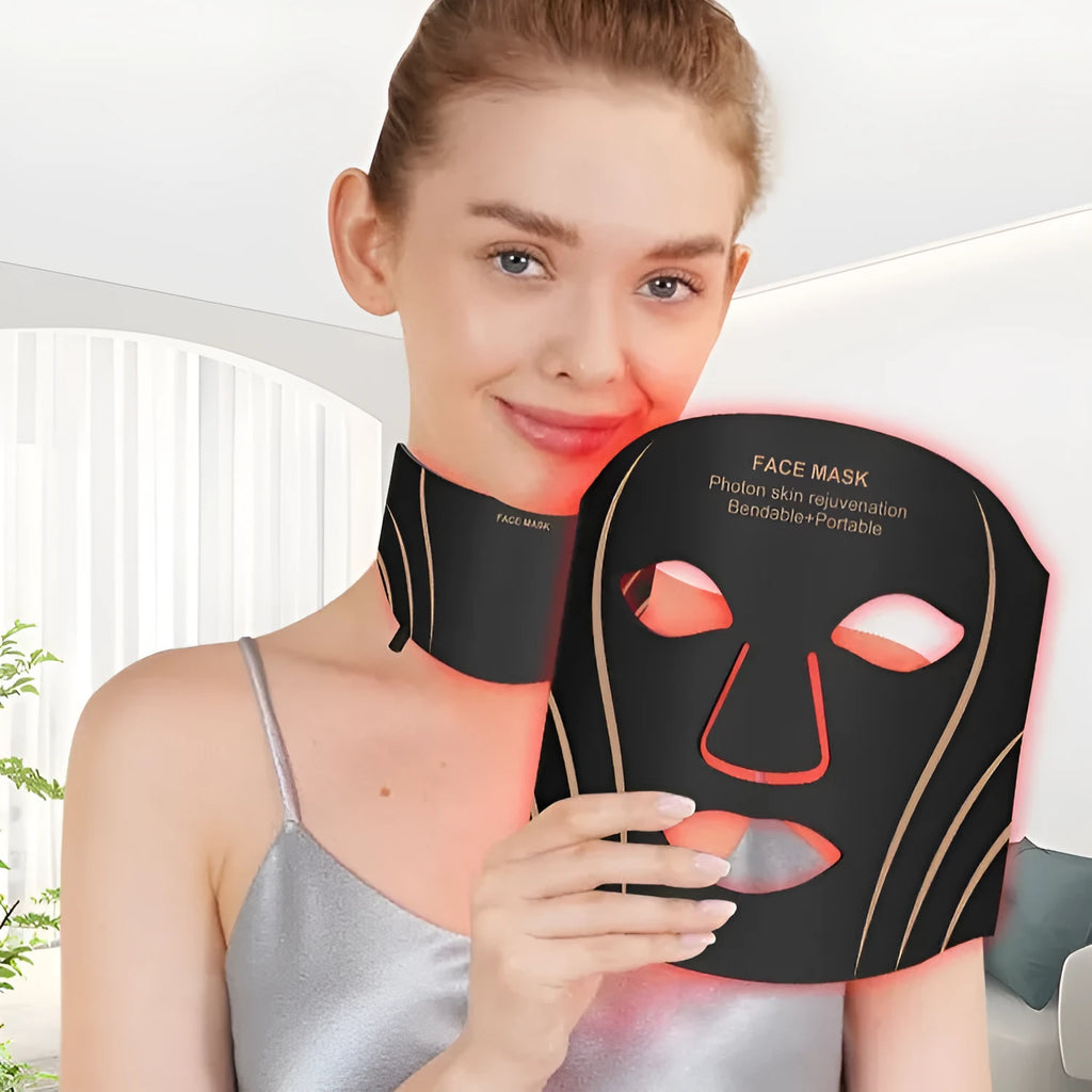 Black and gold silk silicone LED red light facial mask with headband and touch screen controls.