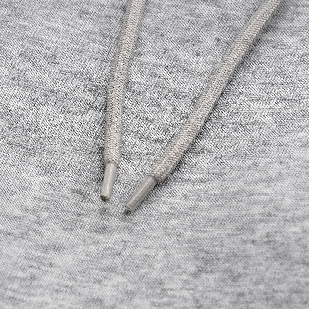 Men's grey cotton trousers with straight wide-leg fit on hanger
