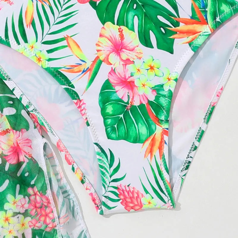 Girls' floral two-piece swimsuit with matching split overlayer in polyester fabric