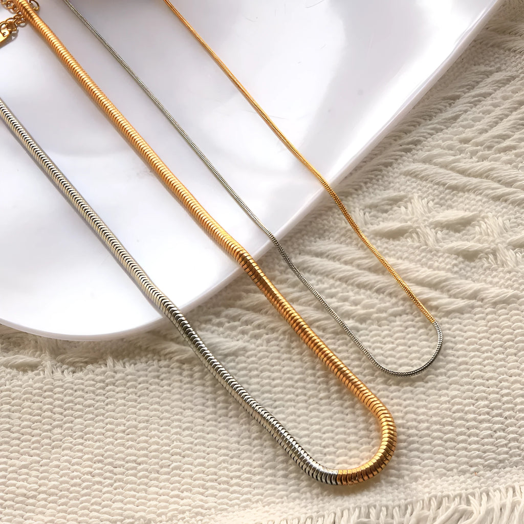 Women's cold gold stainless steel snake bones chain necklace with geometric lines, 3mm thickness