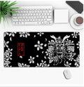 Customisable gaming mouse pad with non-slip base and thermal transfer printed graphics