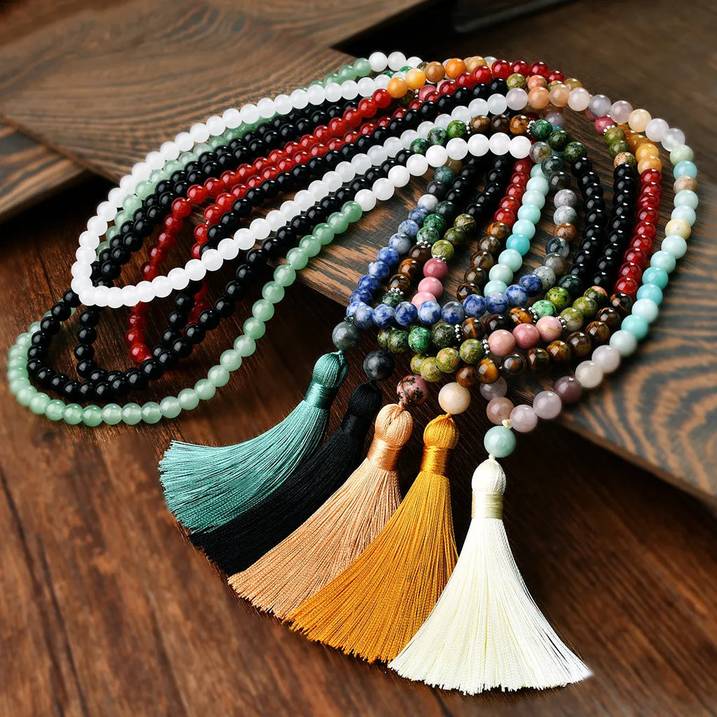 Long handmade Bohemian necklace with a natural stone tassel and mixed gem geometric pendant on an 81cm chain.