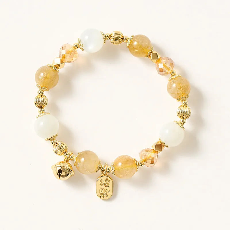 Lucky Fortune gold coloured Korean style bracelet with a single rutilated quartz crystal bead.