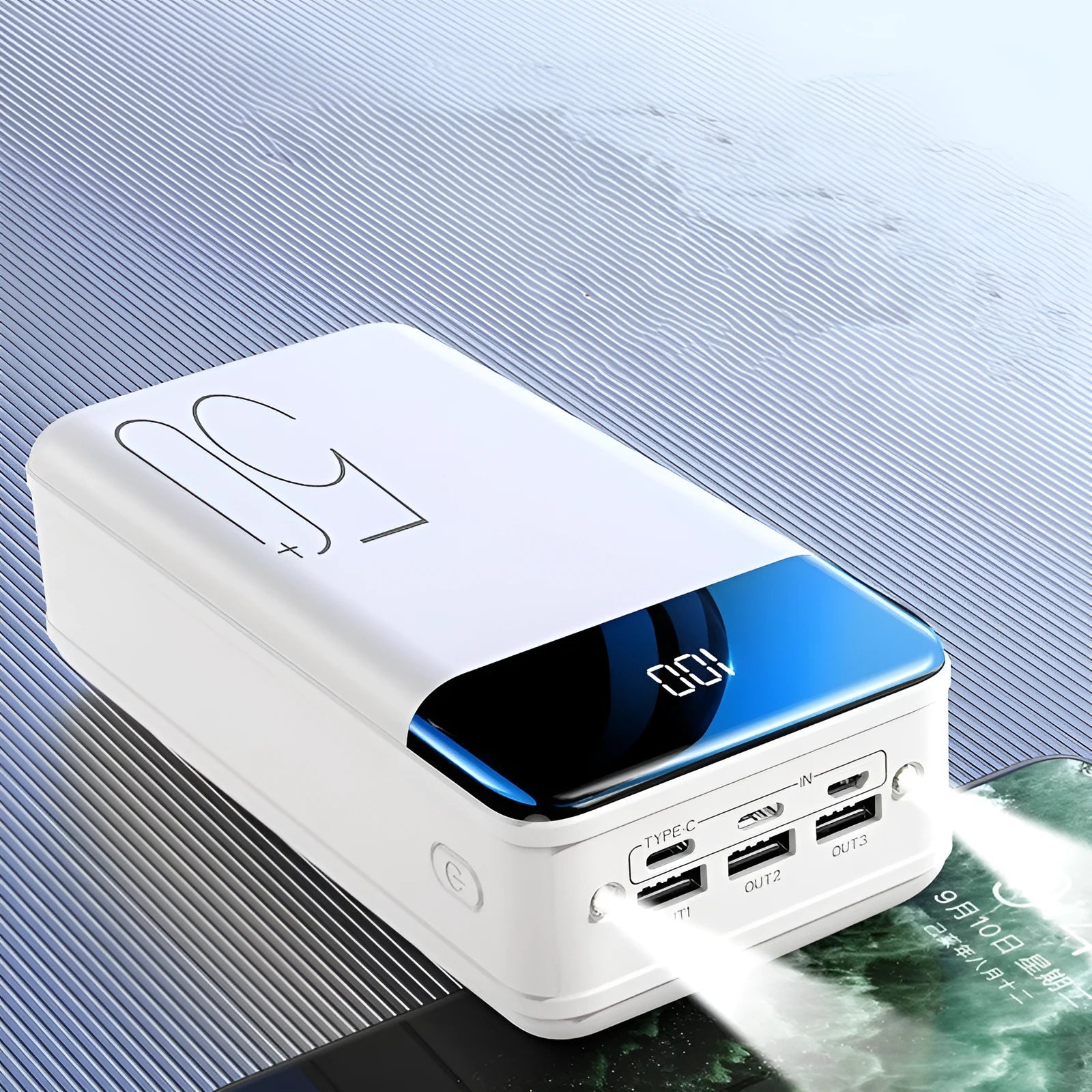 Large capacity 50000mAh power bank in black plastic case with three USB output ports