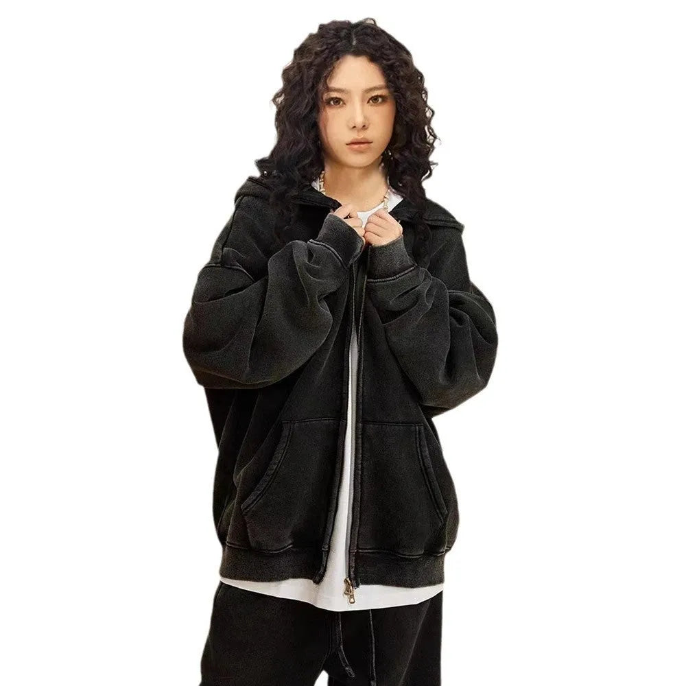 Man's washed cotton hooded cardigan with fleece lining and a double front zipper.