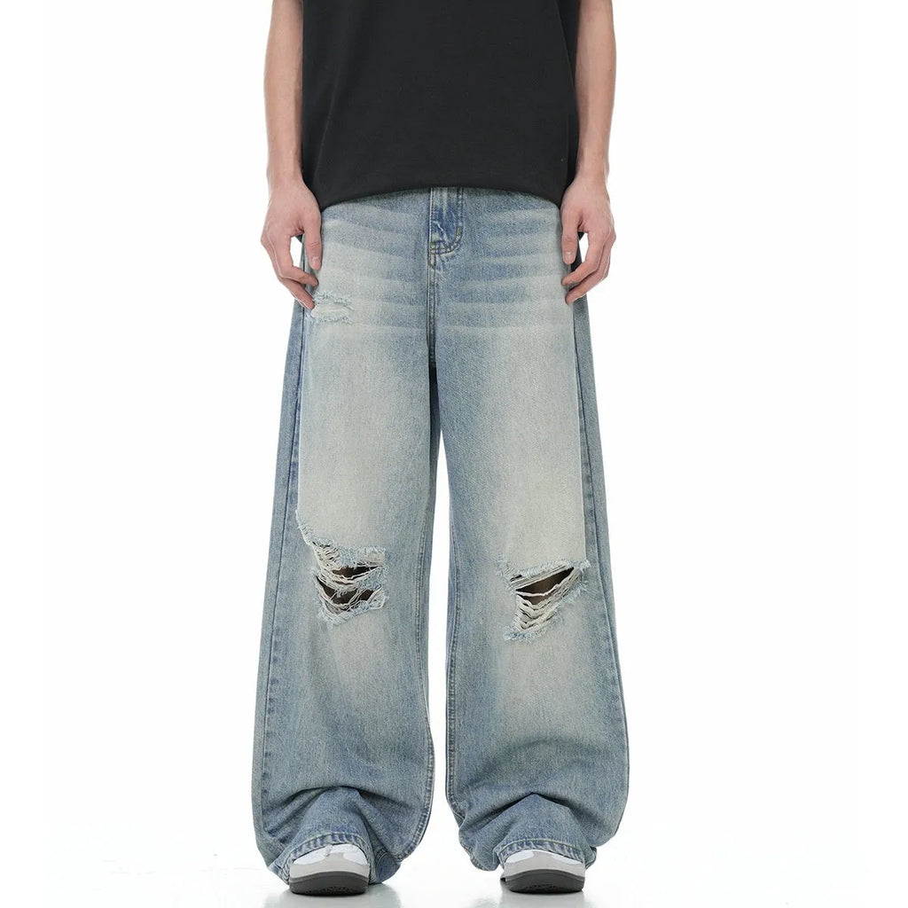 Blue straight-leg men's jeans with a zip fly, shown laid flat.