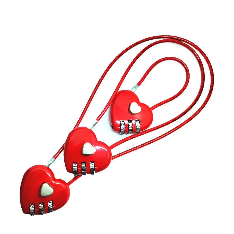 Peach heart-shaped cable lock with a long steel rope, shown in various colours including red, blue, and gold.