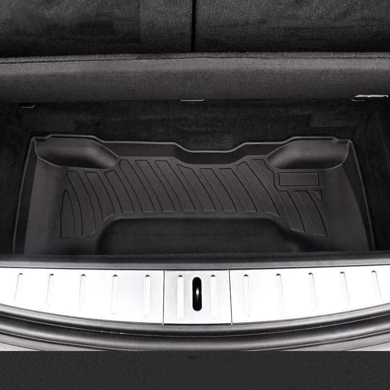 Rubber floor mats with TPE footrests designed for Tesla Model 3, Y, S, and X vehicles.