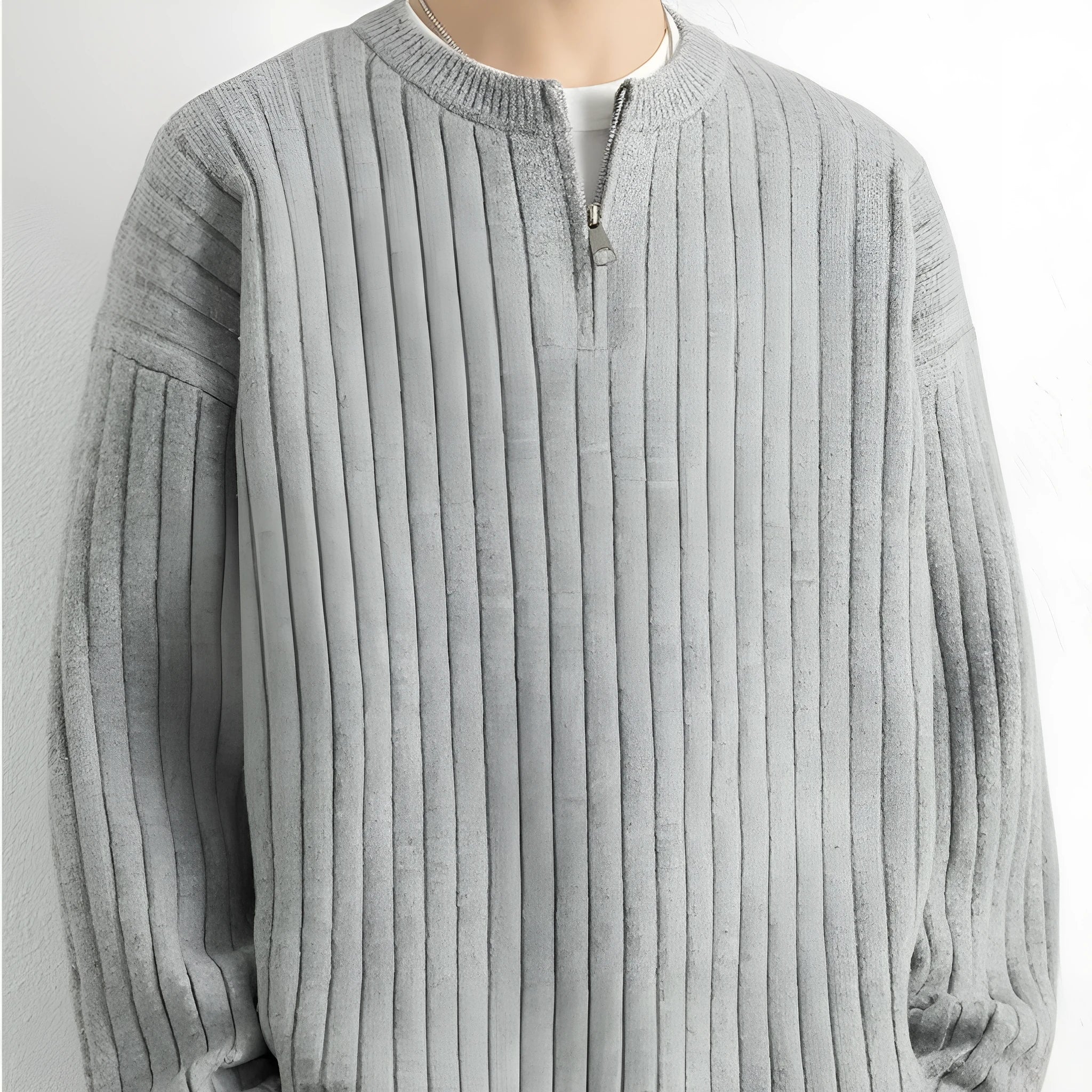 Men's grey half-zip textured knit sweater with loose fit design and long sleeves