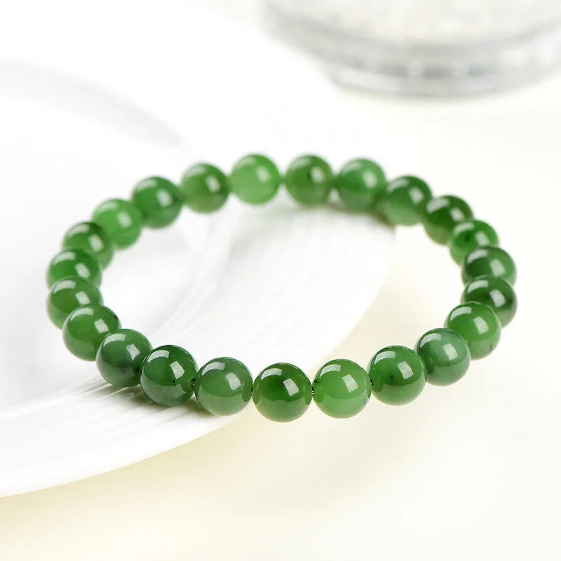 Natural Jasper ball bracelet with polished Hetian jade beads in various size options.