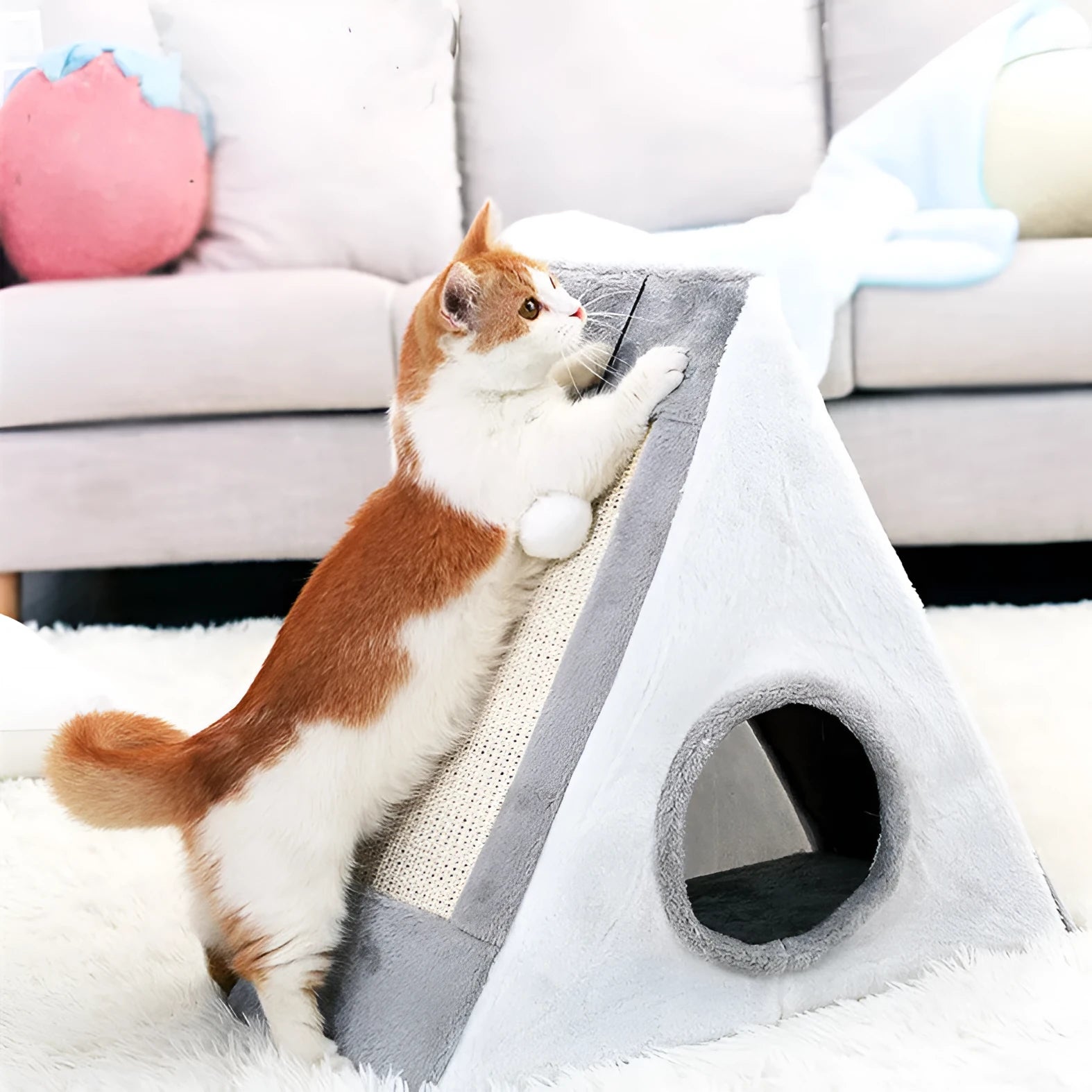 Grey and white triangular cat bed with integrated sisal scratching panels on the side.