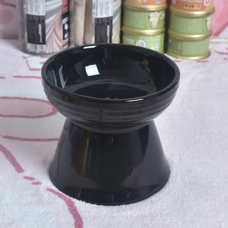 Ceramic pet bowl with high foot design showing anti-tumble stability feature