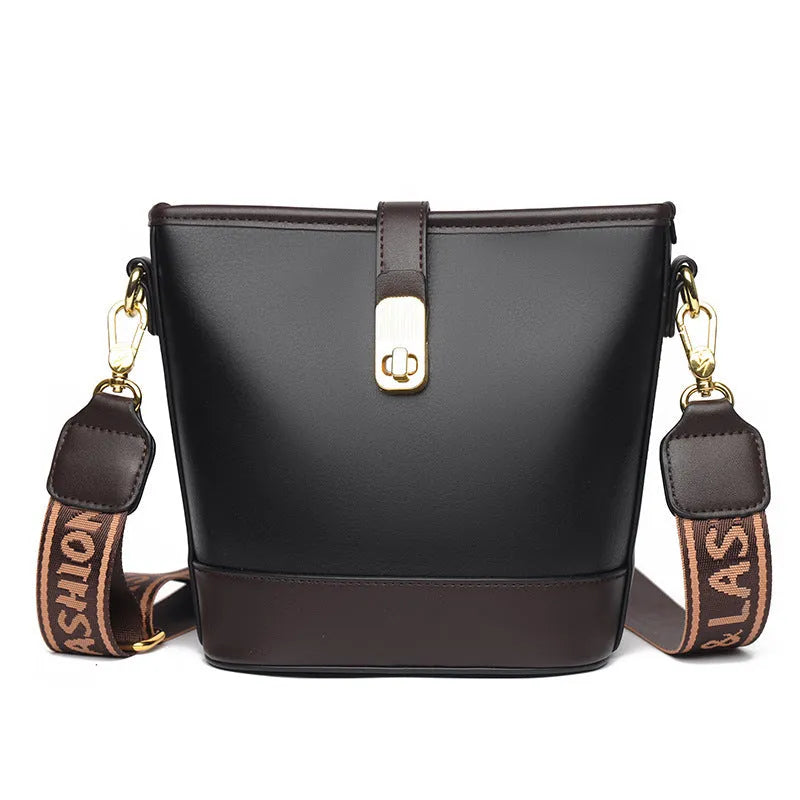 Korean style black bucket bag with dual shoulder straps and multiple internal zippered compartments