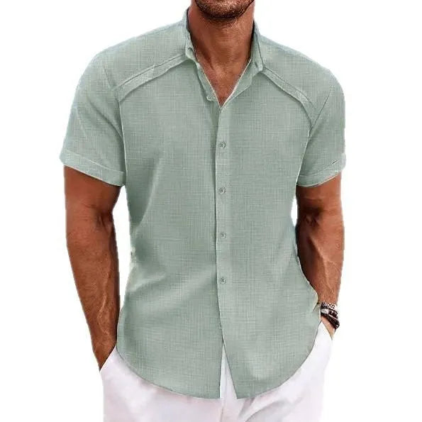 Men's solid colour casual short sleeve shirt in cotton blend fabric on a hanger.