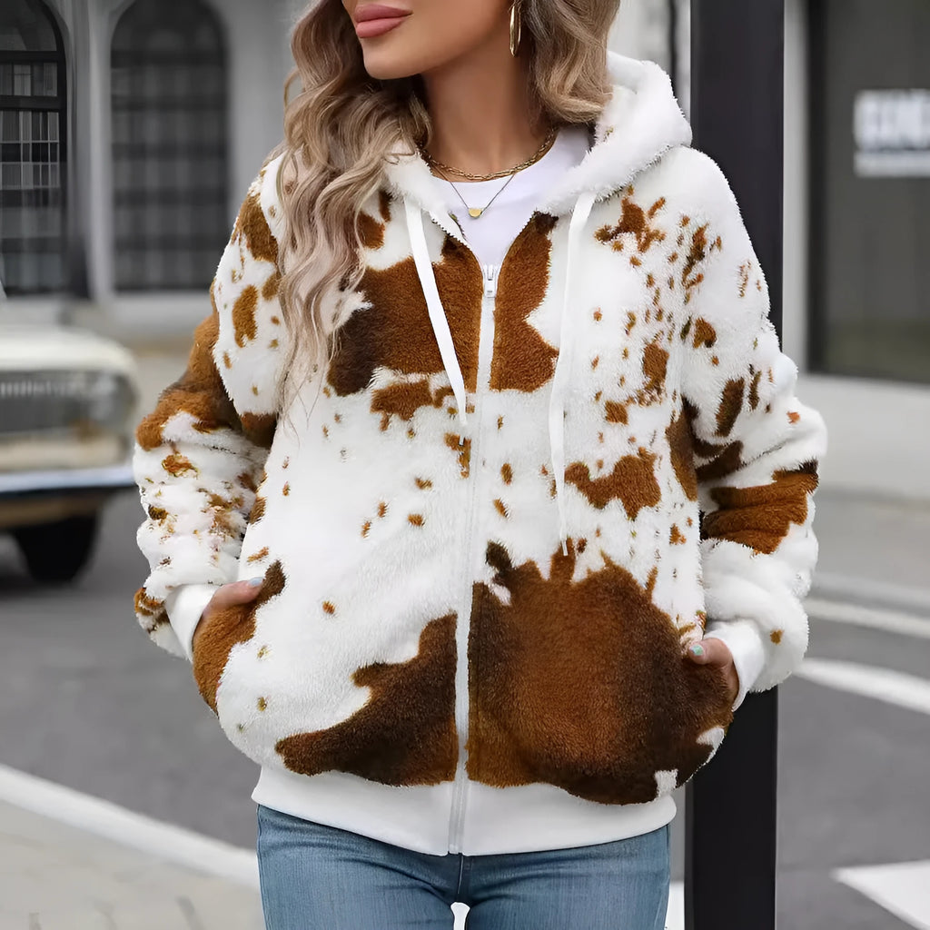 Yellow brown cow animal print hooded cardigan jacket with zip front and regular sleeves.