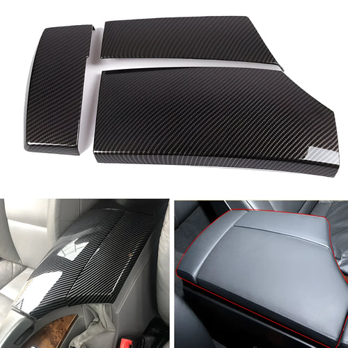 Set of three black ABS plastic armrest box covers with a shiny diagonal carbon fibre weave pattern.