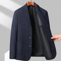 Men's loose fit polyester coat in black colour showing simple solid design for casual wear