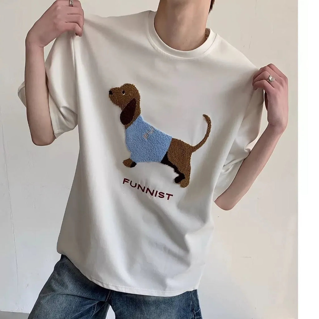 Men's grey cotton t-shirt with embroidered sausage dog holding towel design showing front view