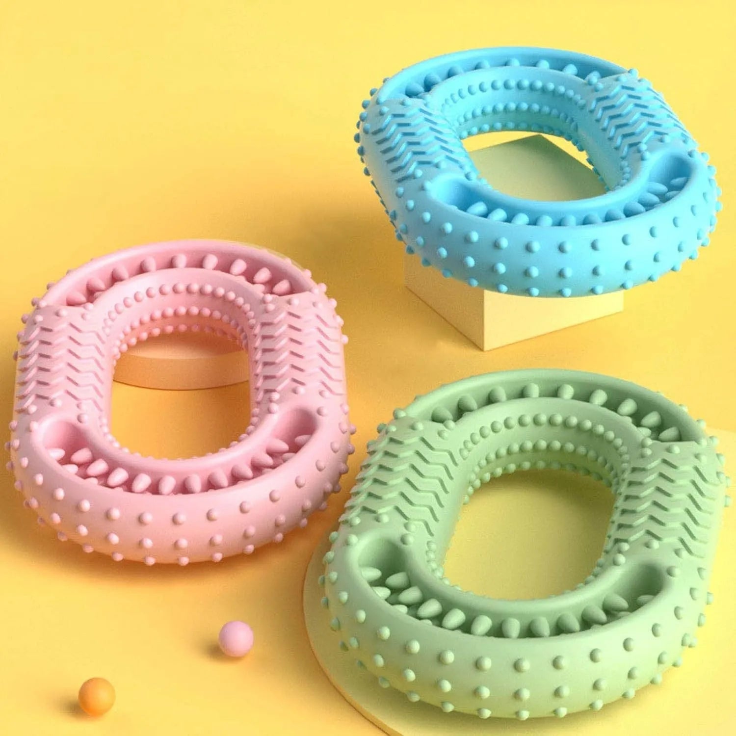 O-ring shaped dog chew toy for aggressive chewers in blue, green and pink colour options