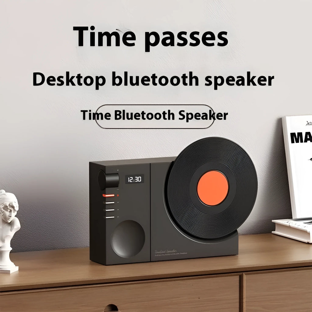 Mini Bluetooth portable speaker with card insertion slot in obsidian black, ivory white, coral pink, or plum green colour