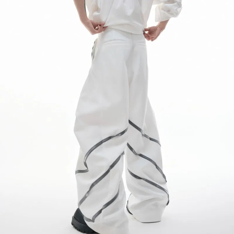Men's grey polyester trousers with metal rivet stripes, front pleats, and a 3D cut, shown in sizes S to XL.