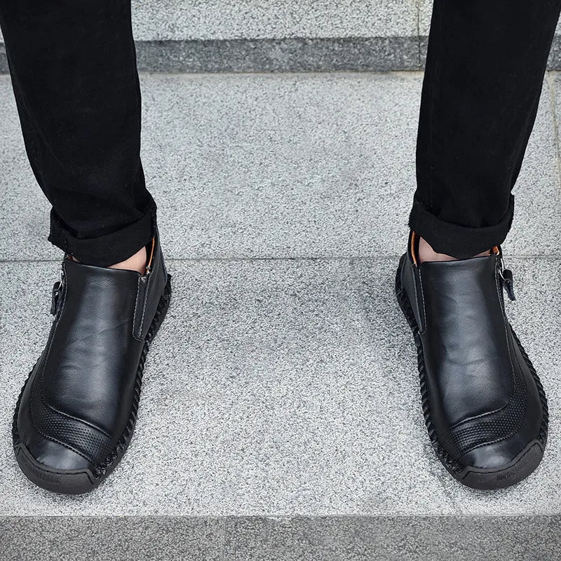 Men's high top lazy driving shoes in black with slip-on design, round toe, and rubber sole