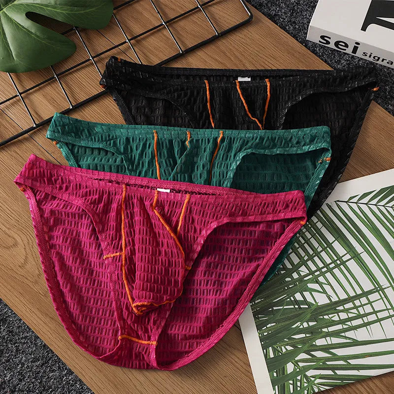 Men's solid colour low waist briefs in lace fabric for sports, shown in multiple colours.